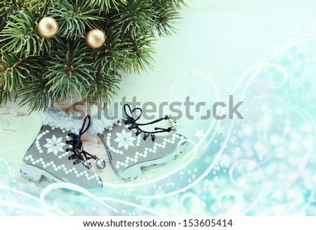 Decorative Christmas racing skates near christmas tree