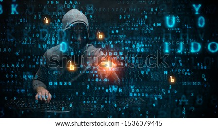 Hacker in hoodie dark theme Royalty-Free Stock Photo #1536079445