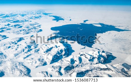 Aerial view winter mountains lanscapes rivers snow ice melting climate change