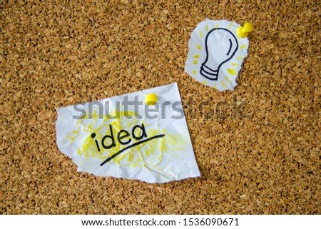 An idea paper posted on the board. Business, idea, creative related picture.