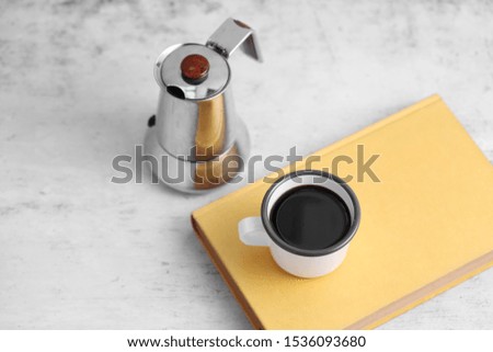 Coffee in cup and books on rustic table with a blank space for a text, Espresso in cup on white background