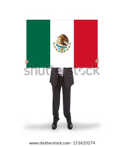 Businessman holding a big card, flag of Mexico, isolated on white