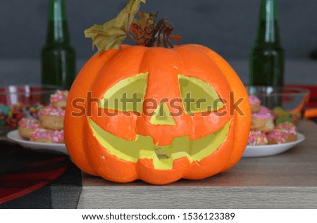 
Pumpkin ghost face decorated at a Halloween party.