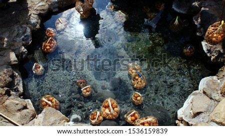 Picture of boiled eggs in a hot spring in Lampang province, Thailand