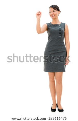 Business woman writing on an imaginary screen - isolated over white