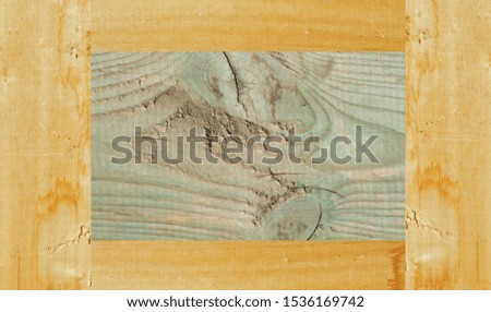old wooden frame in background
