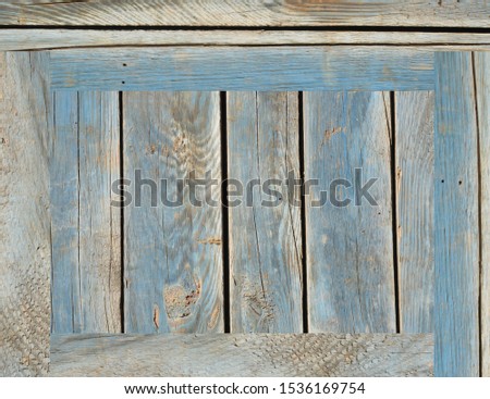 old wooden frame in background
