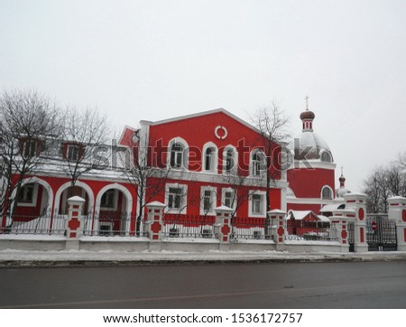church at winter snowfall day 