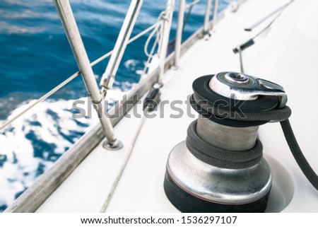 Sailing yacht equipment, sailbot winch close-up photo