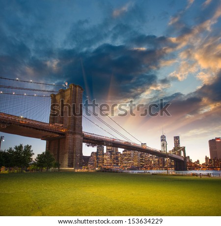 The Brooklyn Bridge as seen from Brooklyn Bridge Park, New York City - Sunset summer view.