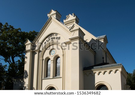 small synagogue in czech republic closeup sunny day, in god we trust
