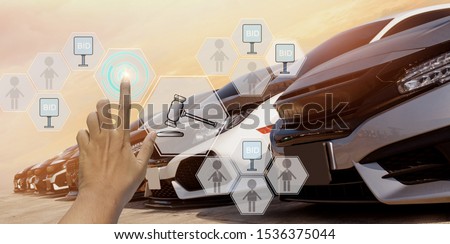 businessman use hand touch icon hologram auction used car,with trading concept and online auction in Automotive Industry,background sunset,banner header panoramic horizontal