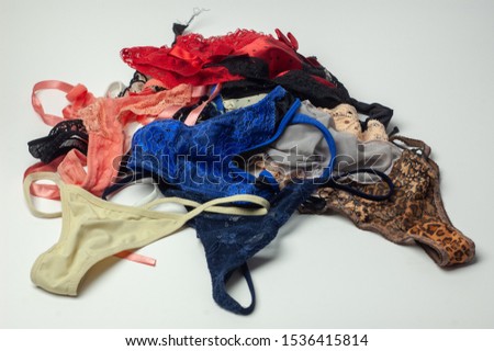 a bunch of multi-colored women's panties