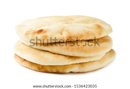 Israeli, geek flat bread pita isolated on white background Royalty-Free Stock Photo #1536423035