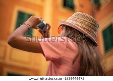 Shooting picture of a 9 years old female child , Photograph concept at the street