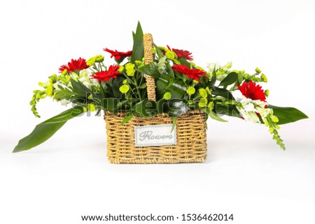 FLowers in a basket isolated on white
