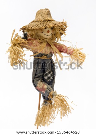 Scarecrow doll on white background