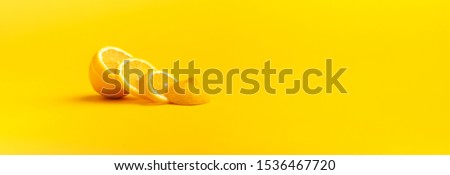 Lemons fruits. Juicy slice of lemon on yellow background, panoramic mock up image Royalty-Free Stock Photo #1536467720