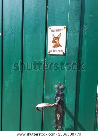 "Warnung vor dem hund"  - "Attention, dog in the yard" white metal sign with a picture of  German Shepherd 