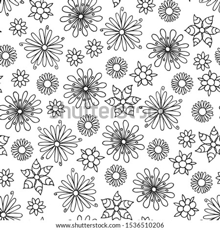 Hand drawn seamless flower pattern in black and white.