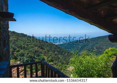 A beautiful view on a small portuguese village from over the top of a mountain 