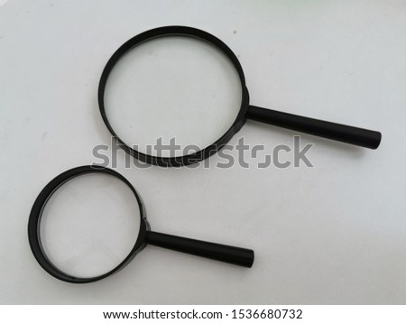 The scientific medical​ magnify​ glass isolated on White background Space In clinic laboratory​ Hospital University Research