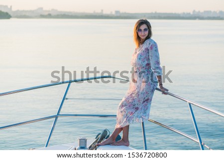 Yacht. The girl is sailing on a yacht