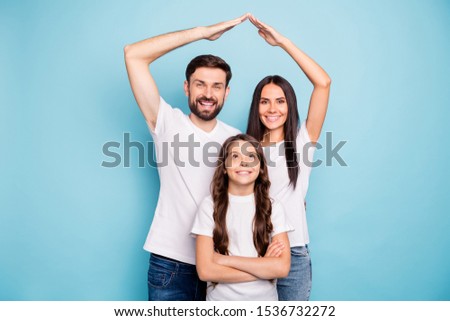 Portrait of positive lovely three people mom mommy dad daddy schoolkid have new comfort home house wear enjoy real estate wear white t-shirt isolated over blue color background