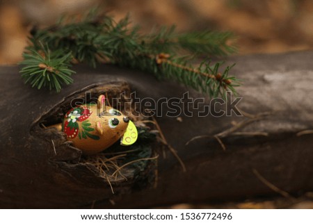 mouse with cheese and branch of  fur tree