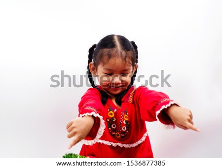 Cute asian baby girl portrait with playing funny action on white backgrounds for Christmas and Happy new year