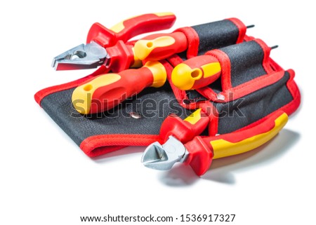 set of tools in smal black toolbag isolated on white