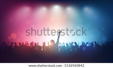 Silhouette of people raise hand up in music concert with red and blue color spotlight on stage background Royalty-Free Stock Photo #1536960842