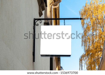 Mock up. Rectangular shape signboard of store, shop, restaurant, office on the wall of classical architecture building