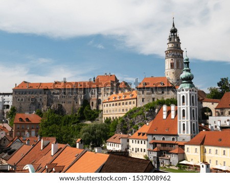 Cityscape picture overlooking medieval city of Cesky Krumlov medieval city. Captured during summer sunny day.