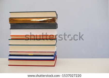 A bunch of books on the shelf