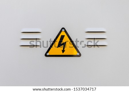 high voltage signal over metal door