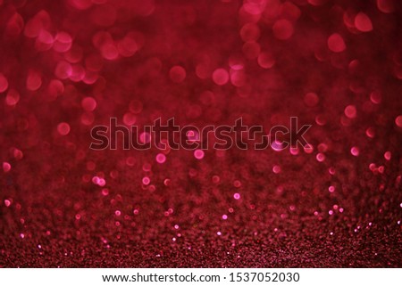 Abstract red sparkle background with copy space. Christmas concept.