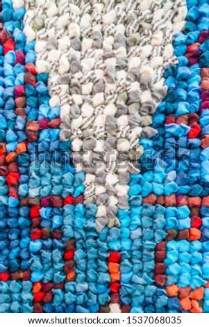 Abstract Wool pattern texture design. Colorful entrance sign close up. Textile material fabric, with square patterns. Macro close up shots. Shot in Lima, Peru