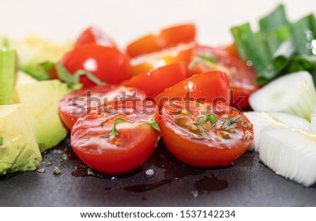 Salad - avocado, spring onion and tomato stock photo