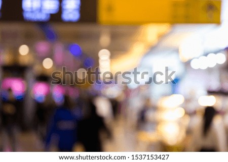 Blurred crowd of people shopping in department store underground at subway in Korea