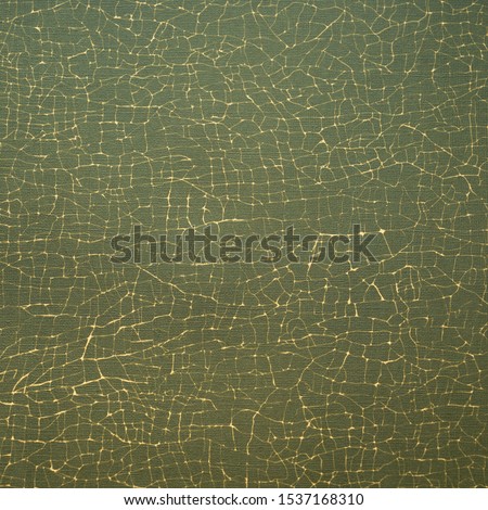 Cracked pattern abstract yellow on green paper background