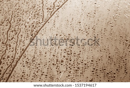 Wet plastic transparent old wrap texture in brown tone. Abstract background and texture for design.