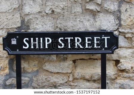 cast iron traditional street sign labelling Ship Street in Oxford, England probably named after a pub or tavern which was once in the street