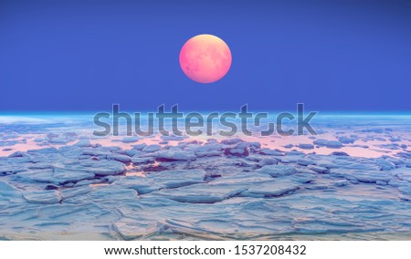 Lunar eclipse with Ice on the ocean shore  "Elements of this image furnished by NASA"
