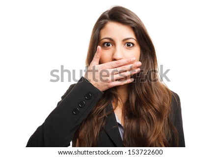 Woman shutting her mouth Royalty-Free Stock Photo #153722600