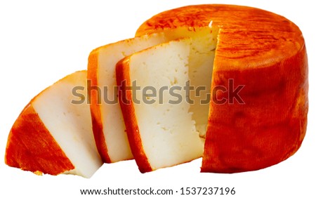 Picture of tasty french goat cheese with pepper. Isolated over white background