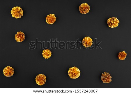 Christmas pattern of holiday decorations on dark background