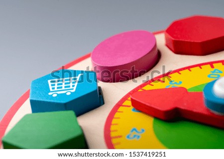 Online shopping icon on colorful jigsaw puzzle for global concept 