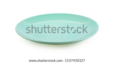 Empty green plate on white background