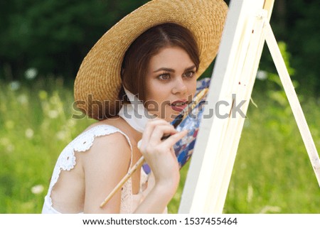 young beautiful showy woman in easel hat